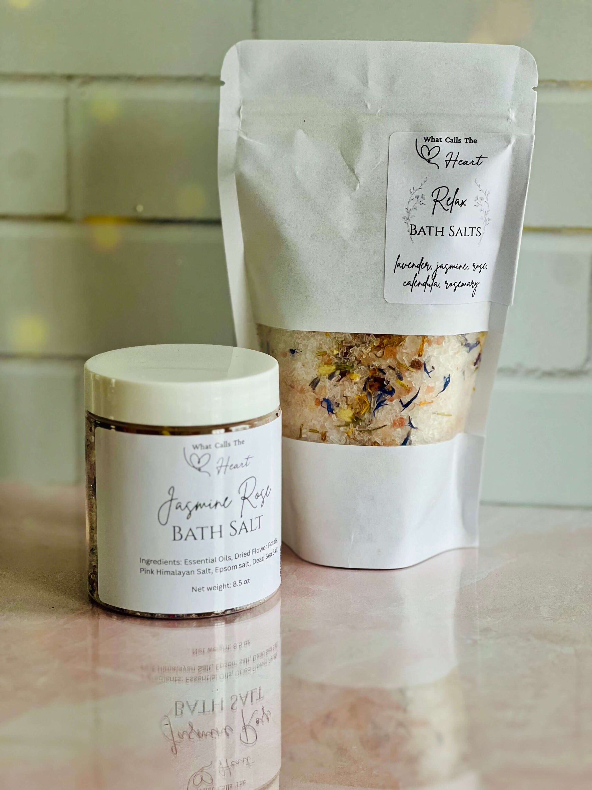 Handmade Jasmine Rose bath salts in jars and pouches, crafted with natural ingredients for a soothing soak.