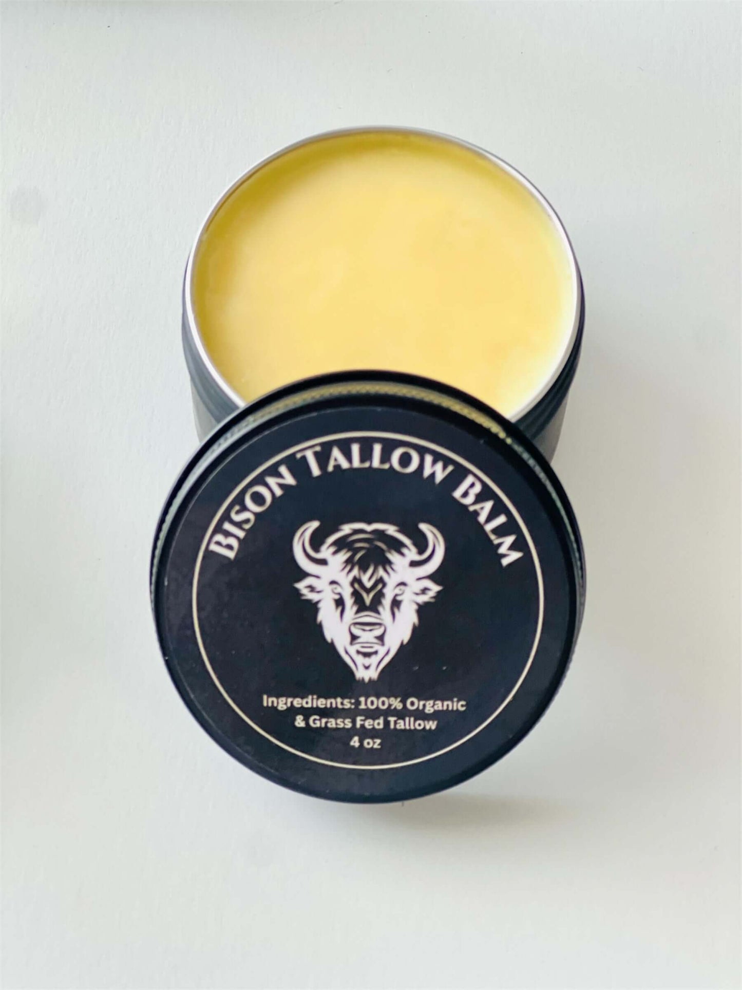 4 oz Bison Tallow Balm with organic ingredients for deep skin hydration and nourishment.