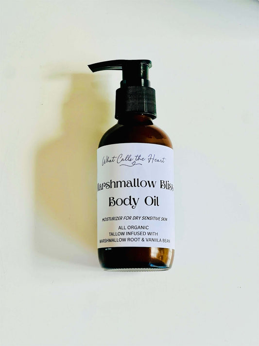 Marshmallow Bliss Body Oil in a pump bottle, perfect for dry and sensitive skin, infused with tallow and vanilla bean.