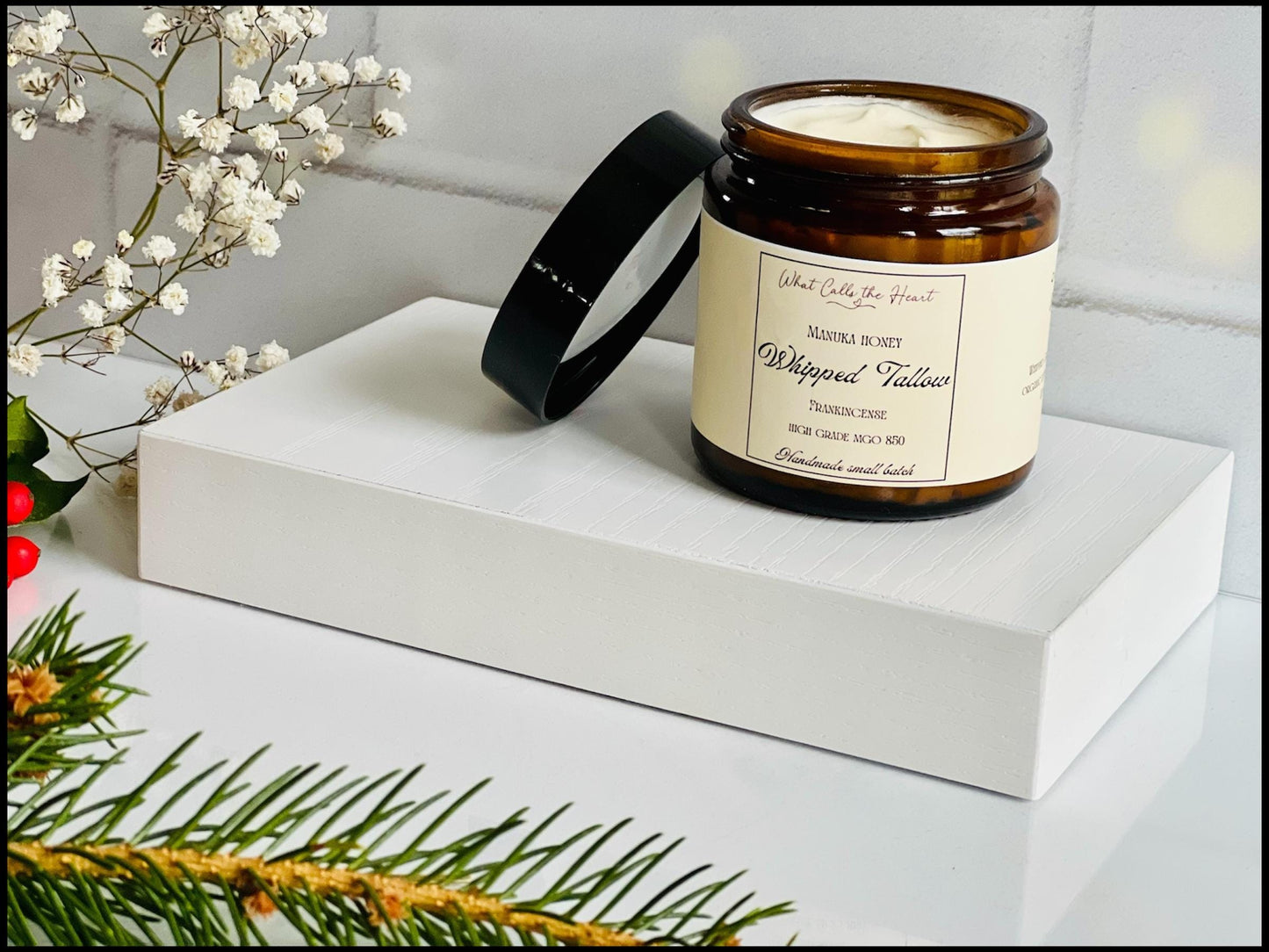 Showing the amber jar with a white background.