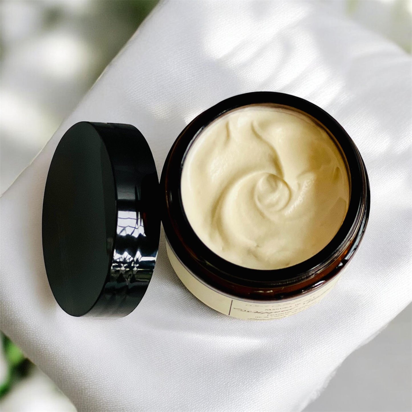 The lid is off showing the contents on a white background.